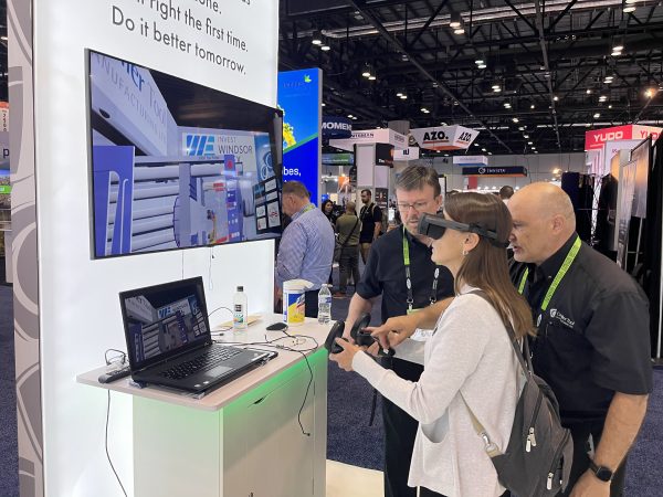 Christina Fuges being shown the Cavalier VR Simulation.